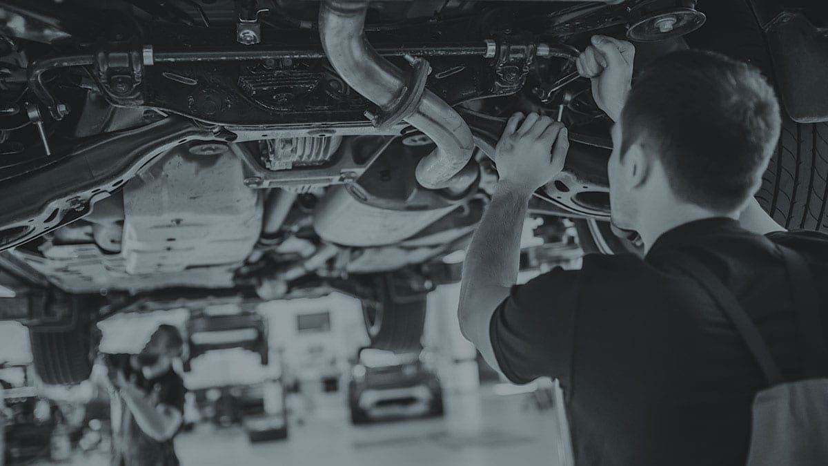 car mechanics doing inspection