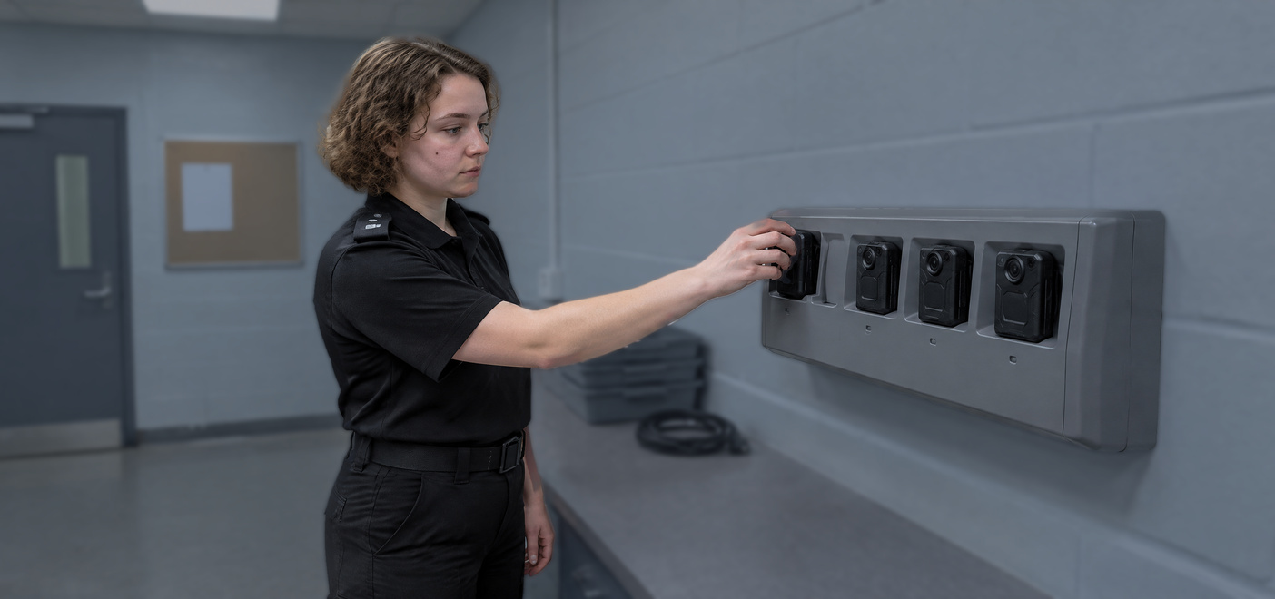 Police officer collecting a body-worn camera, footage used in assault offences